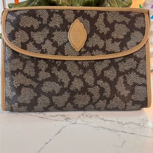 Authentic Yves Saint Laurent vintage clutch with COA